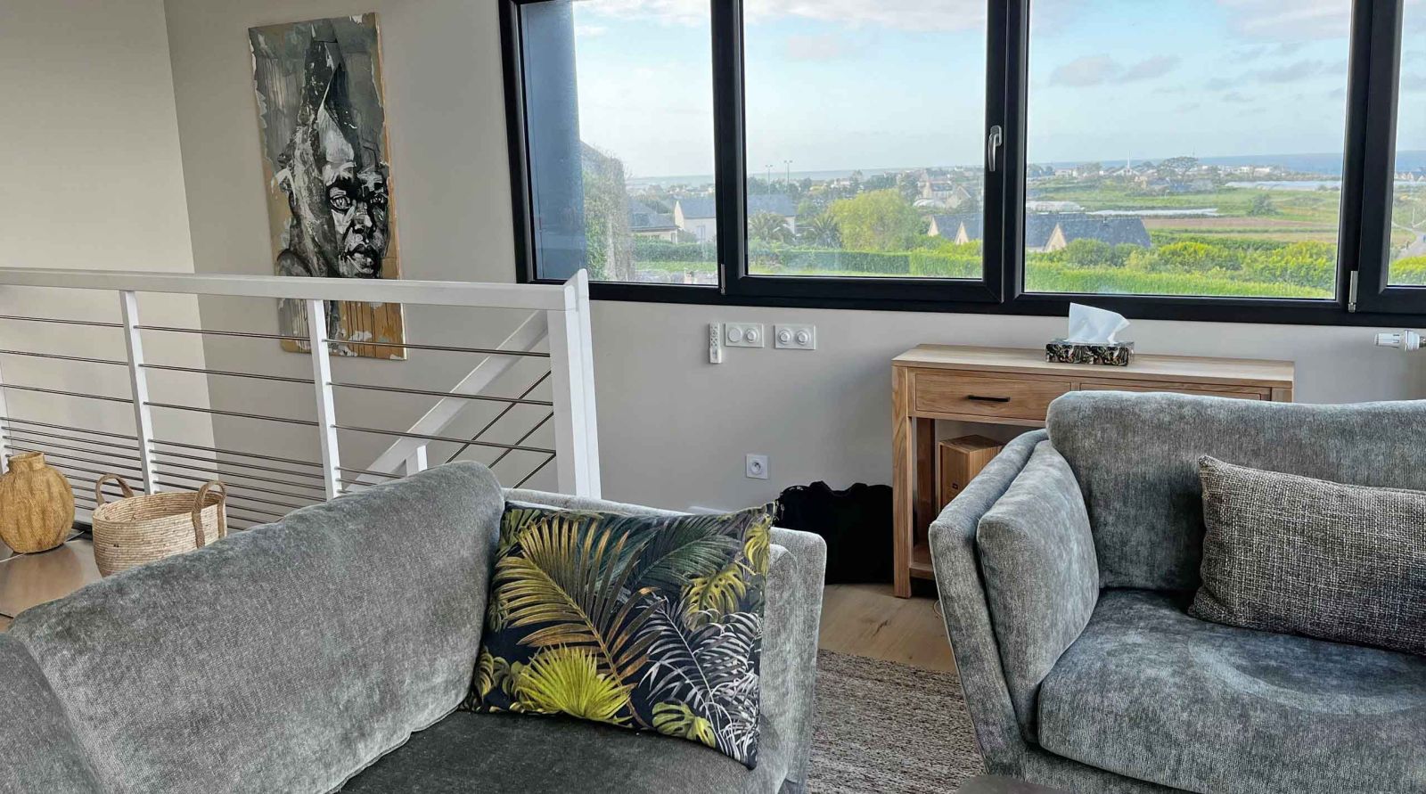 bright living room with bay view